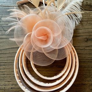 Hand made Derby headband fascinator. Lively light pale peach color.
